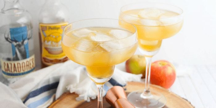 Two delicious apple cider margarita beverages.