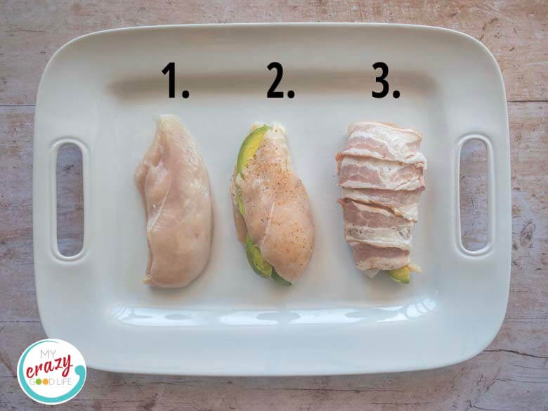 three chicken breastsâ€“one butterfly cut, one stuffed with avocado, one wrapped with bacon