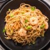 image from above with black bowl full of Bang Bang Shrimp Pasta