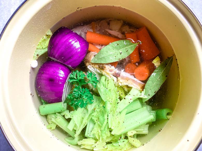 ingredients for homemade turkey stock in the pot