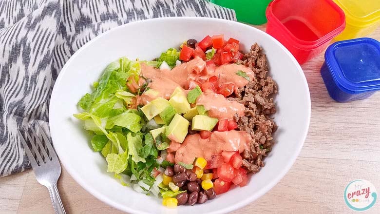 carne asada burrito bowl in white bowl.