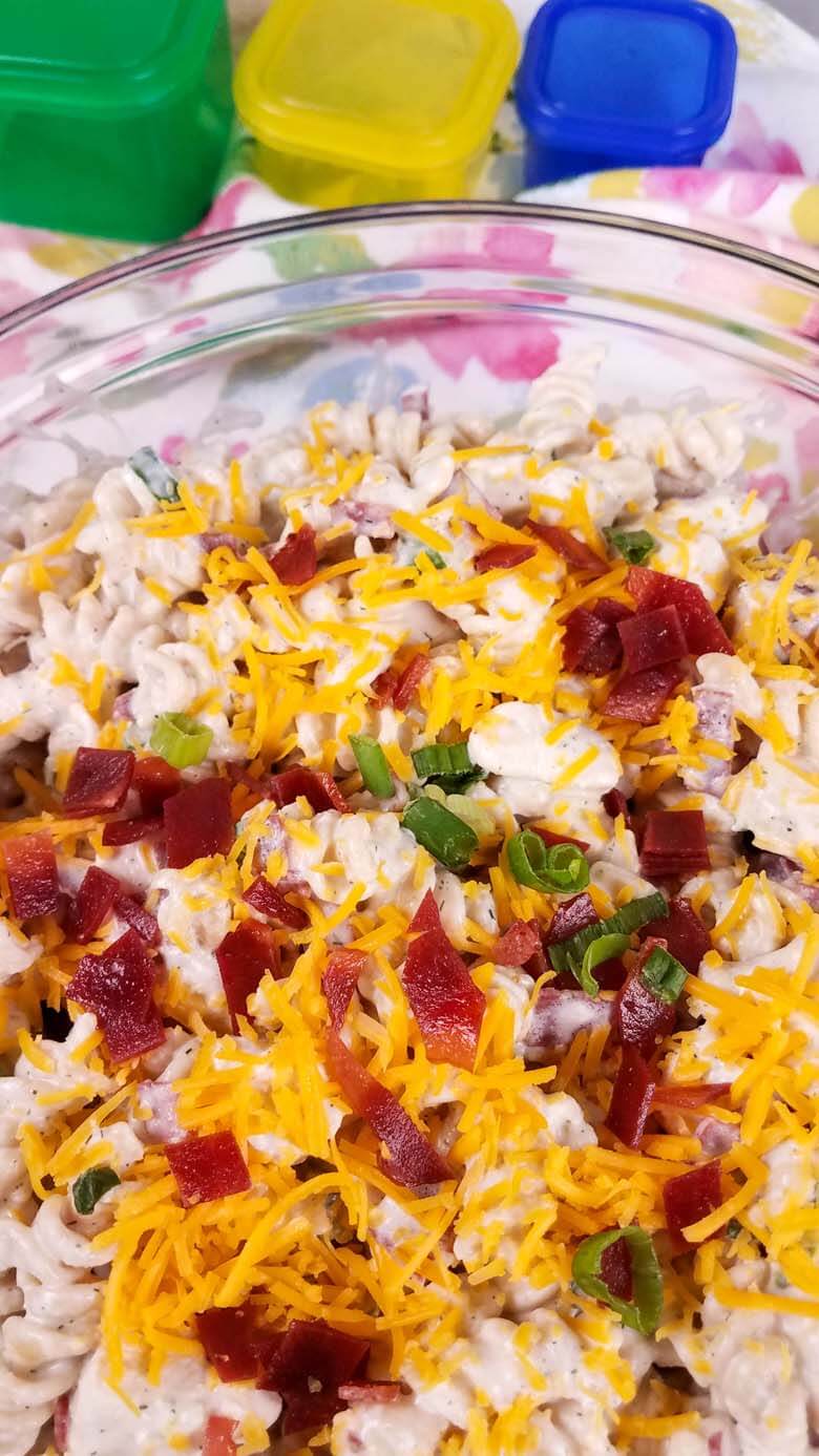 crack chicken pasta salad in a clear bowl