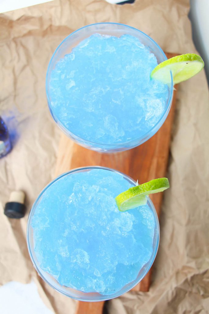 Top only view of these two frozen blue margaritas. 