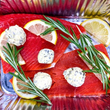 uncooked sockeye salmon in foil tin