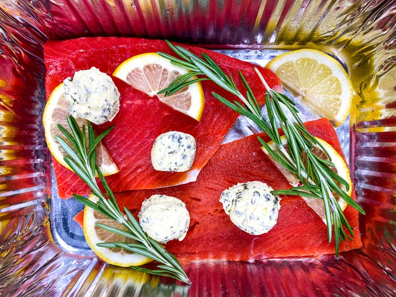 uncooked sockeye salmon in foil tin