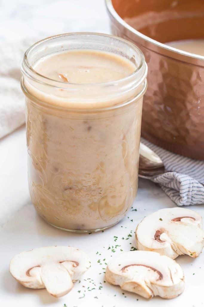 cream of mushroom soup in mason jar with sliced mushrooms