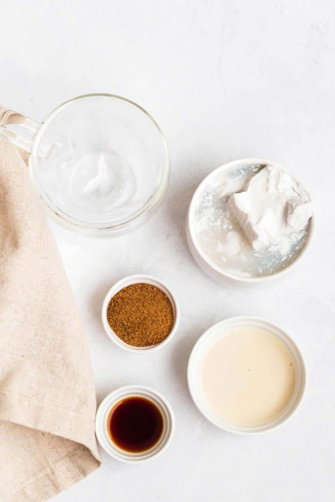 ingredients in white bowls on white counter