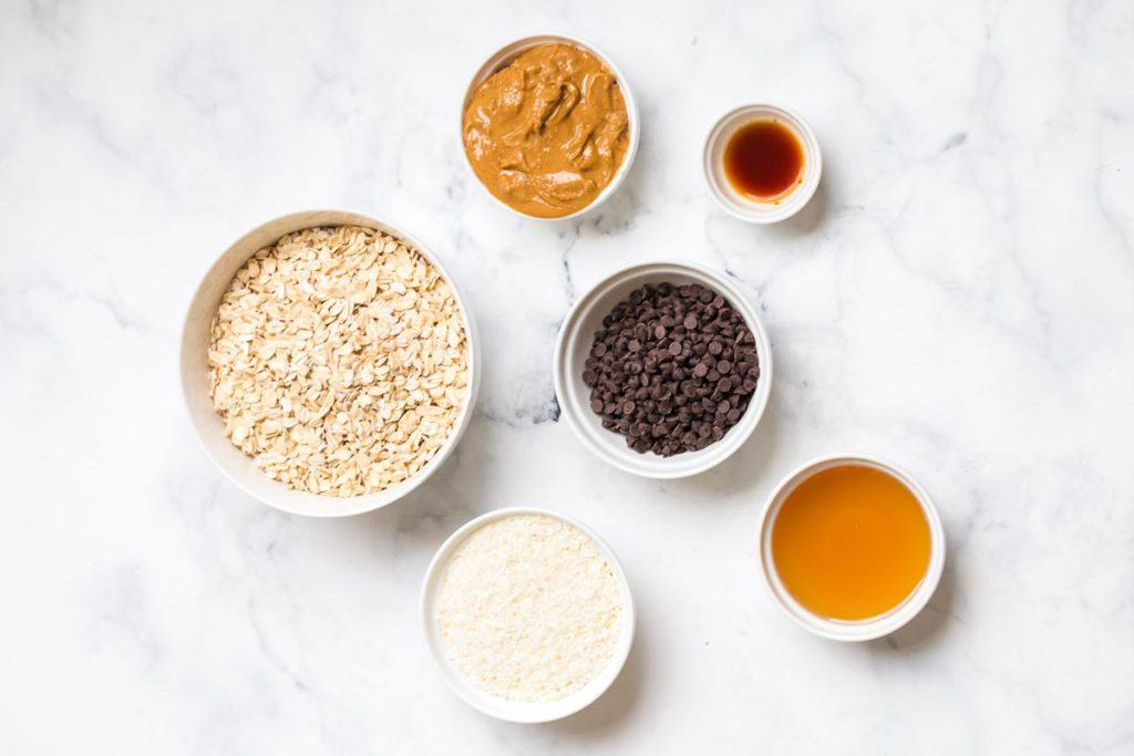 ingredients in white bowls, used yo make Ingredients in Weight Watchers Protein Balls with Peanut Butter