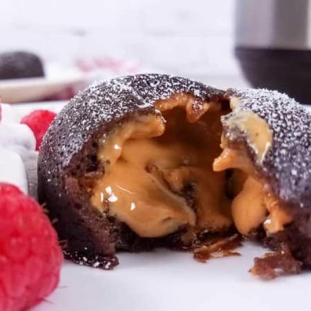 open peanut butter lava cake with peanut butter melting out