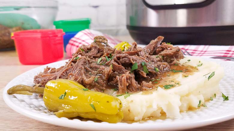 mississippi pot roast and mashed potatoes on white plate