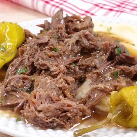 mississippi pot roast with pepperoncinis on a white plate