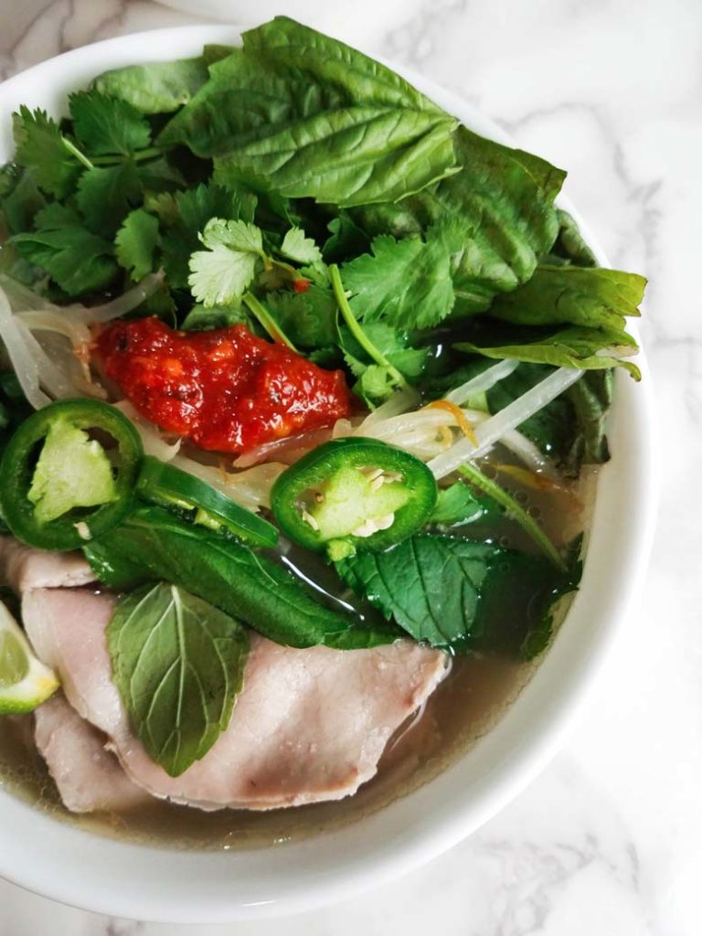 bowl of instant pot beef pho on white counter