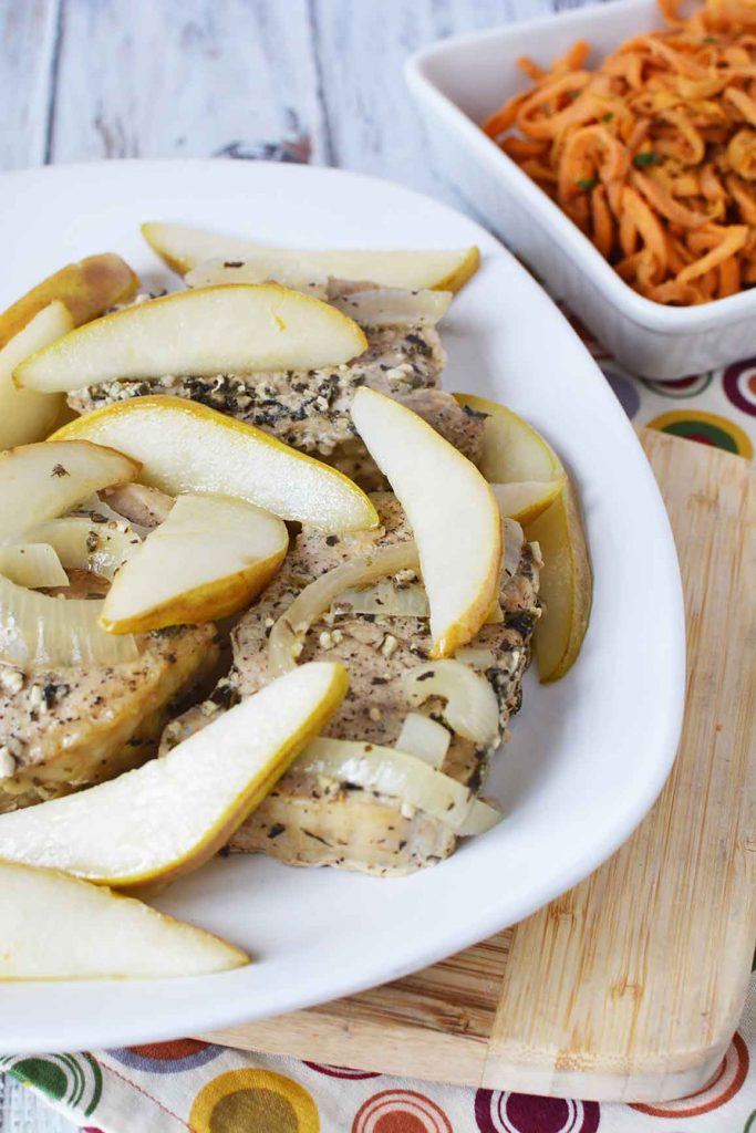 Easy Crockpot Pork Chops with Pears on white plate