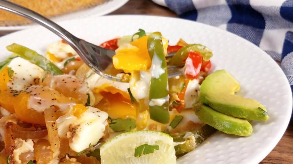 close up of fork with breakfast fajitas