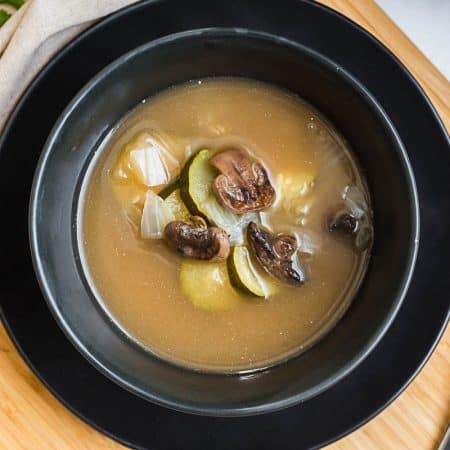 aerial view of black bowl of Bone Broth Soup