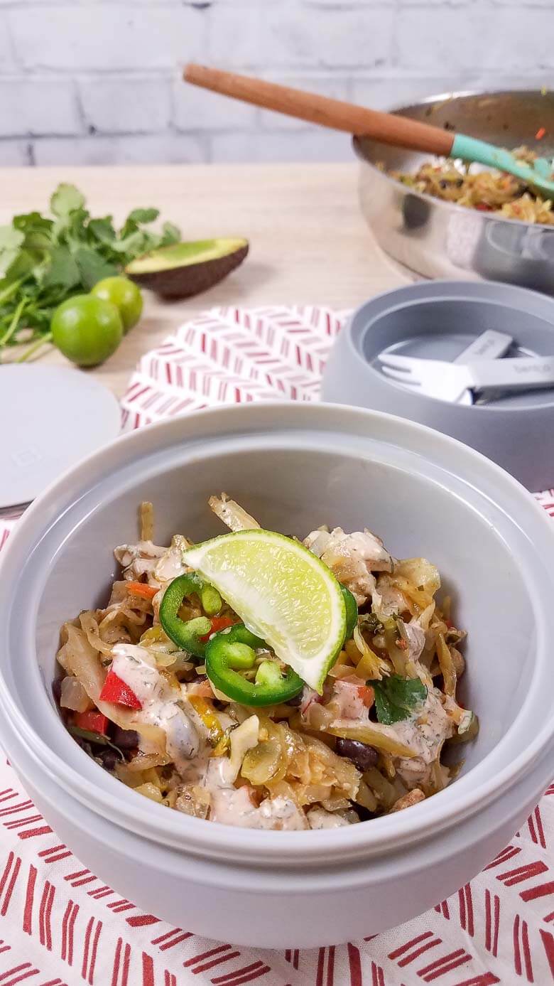 egg roll in a gray and white meal prep container