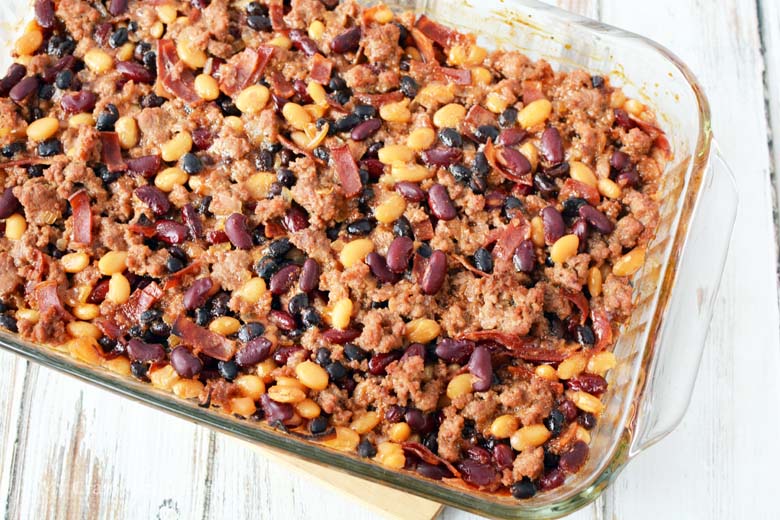 This homemade healthy baked beans with ground turkey literally makes the best baked beans I've ever had–it's an old family recipe that I've lightened up a bit with turkey, turkey bacon, and a homemade pork and beans recipe instead of the canned stuff. 