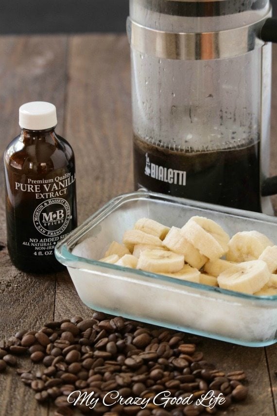 All of the ingredients for Weight Watchers dairy free coffee ice cream. Bananas, coffee extract, coffee, with some coffee beans.