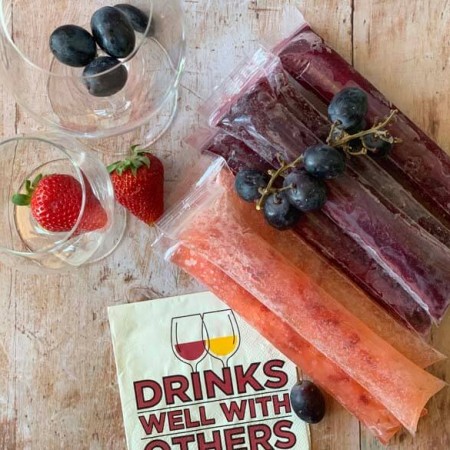 wine popsicles on a wood background